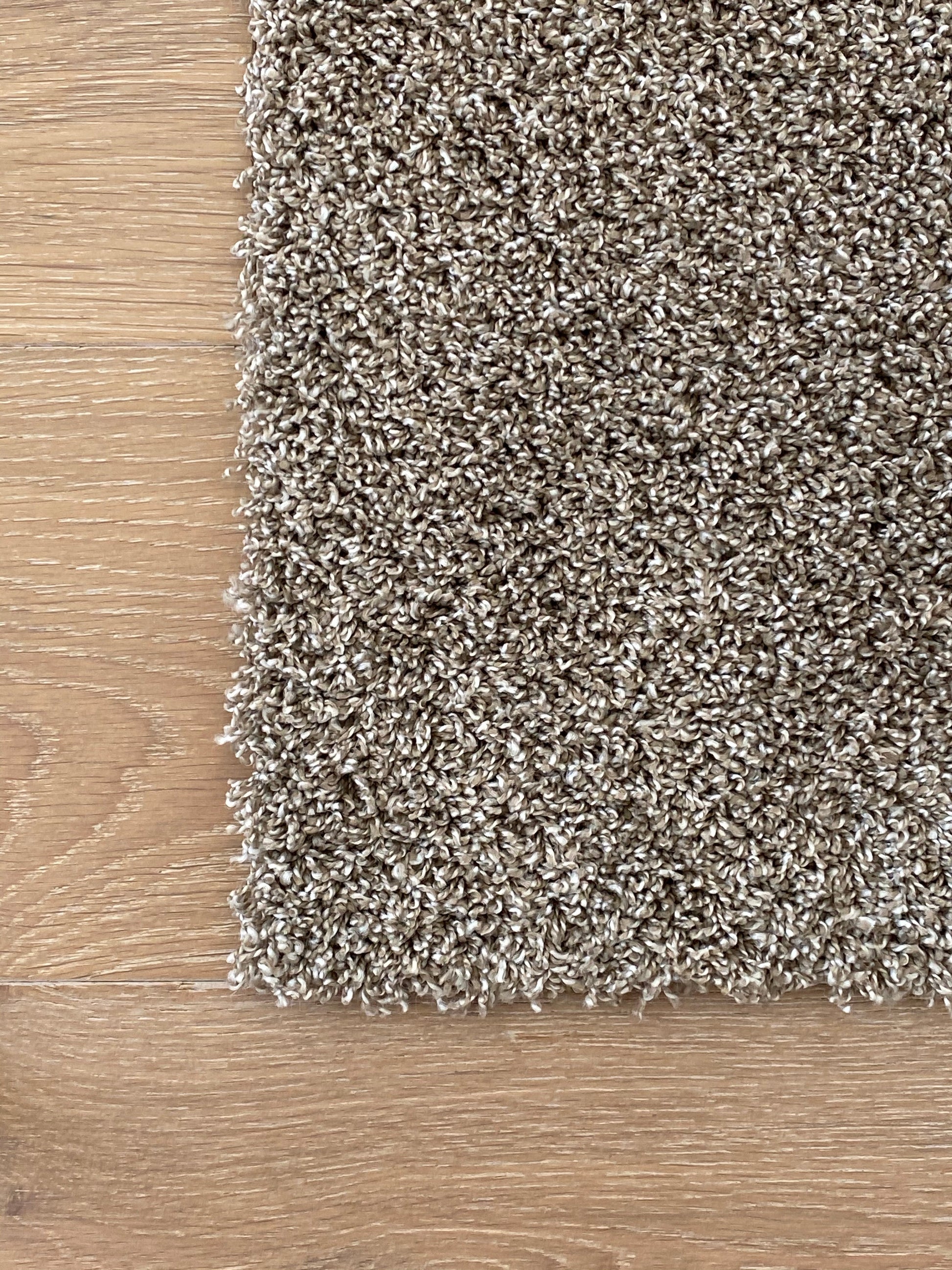 Beige diy carpet.