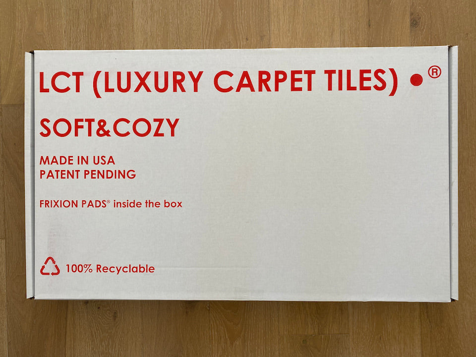 Box of diy carpet tile.