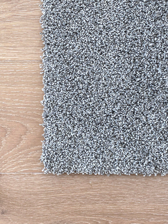 Gray machine washable carpet tile.